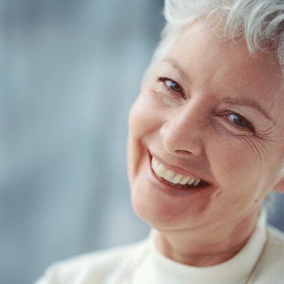 Smiling senior patient at Centerpointe Dental in Burnsville and Lakeville, MN
